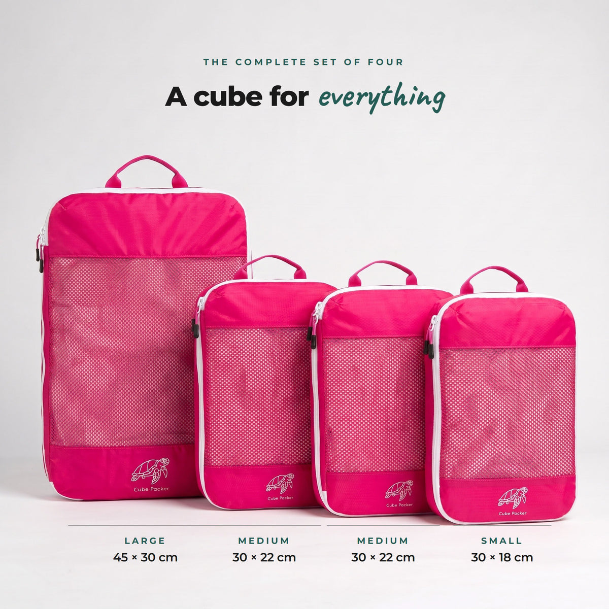 Set of four Flamingo Pink Cube Packer compression packing cubes: 1 large 45x30cm, 2 medium 30x22cm and 1 small 30x18cm