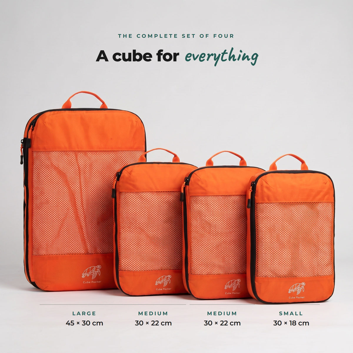 Set of four Nemo Orange Cube Packer compression packing cubes: 1 large 45x30cm, 2 medium 30x22cm and 1 small 30x18cm
