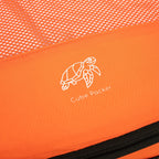 Close up of Cube Packer compression packing cube in orange showing mesh fabric and logo detail