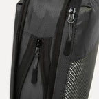 Close up of Cube Packer compression packing cube zip in black showing durable fastening detail