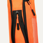 Close up of Cube Packer compression packing cube zip in orange showing durable fastening detail