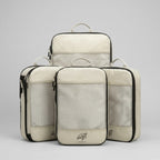 Cube Packer compression packing cubes set of four in cream for organised travel packing