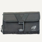 Closed Cube Packer roll-up  toiletries bag in black designed for compact and organised travel storage