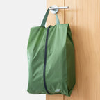 Cube Packer shoe bag in green for clean and organised travel storage