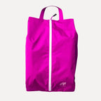 Cube Packer shoe bag in pink standing upright for clean and organised travel storage
