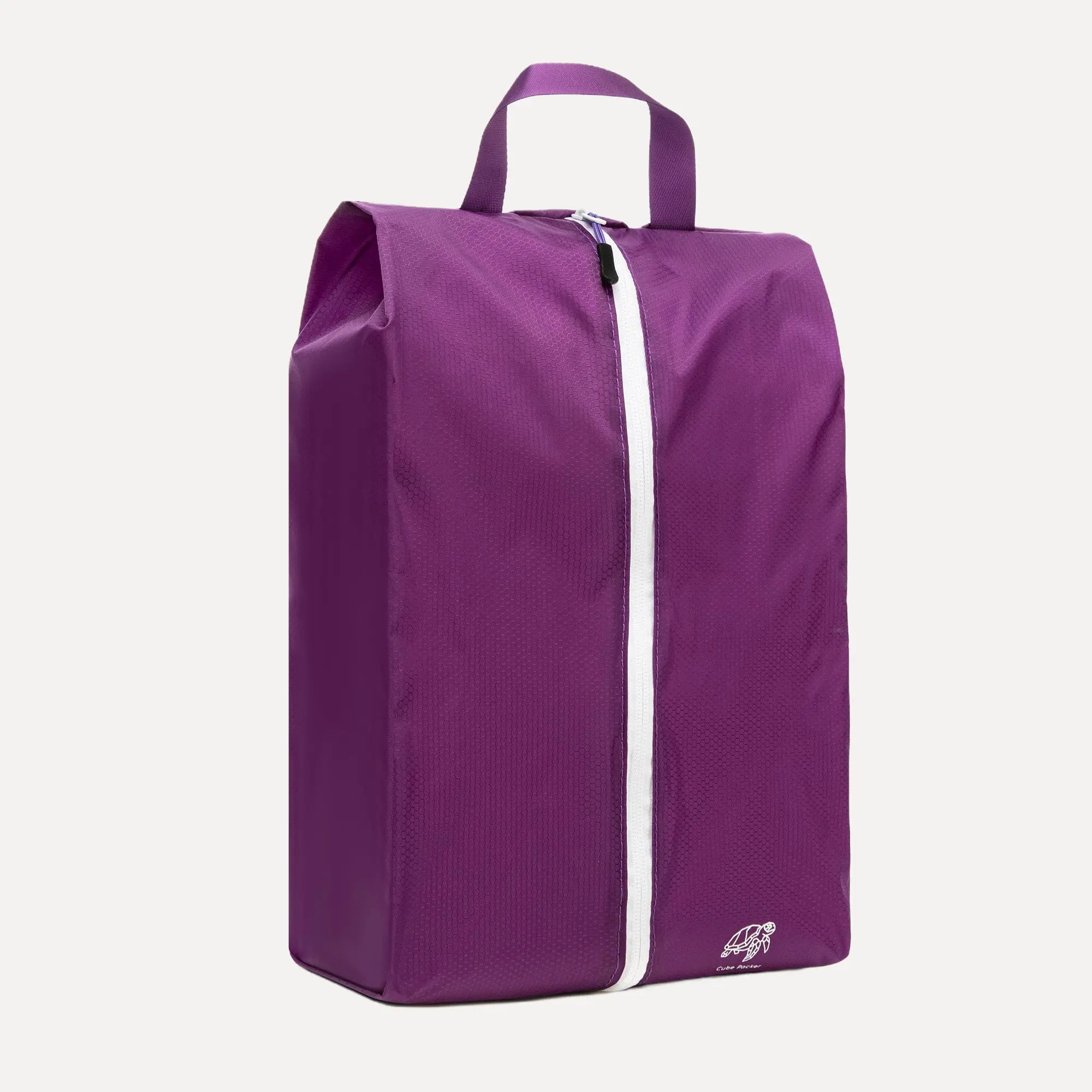 Cube Packer shoe bag in purple standing upright for clean and organised travel storage