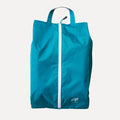 Cube Packer shoe bag in teal standing upright for clean and organised travel storage