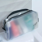 Toiletries bag showing organised contents clearly visible inside compartments
