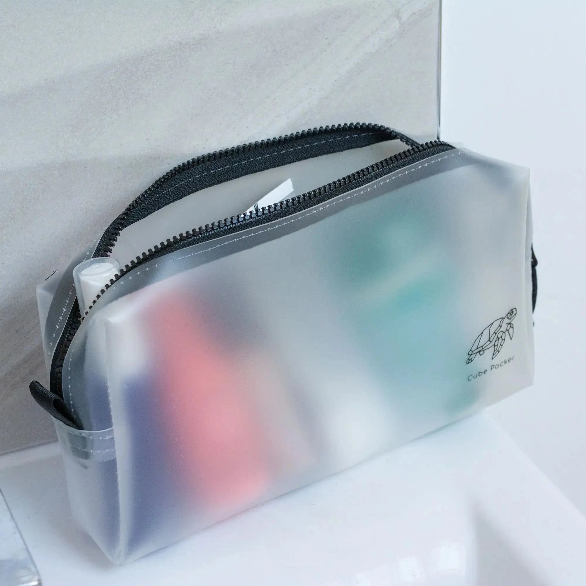 Toiletries bag showing organised contents clearly visible inside compartments