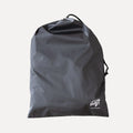Cube Packer travel laundry bag in black with drawstring closure for separating clothes while travelling