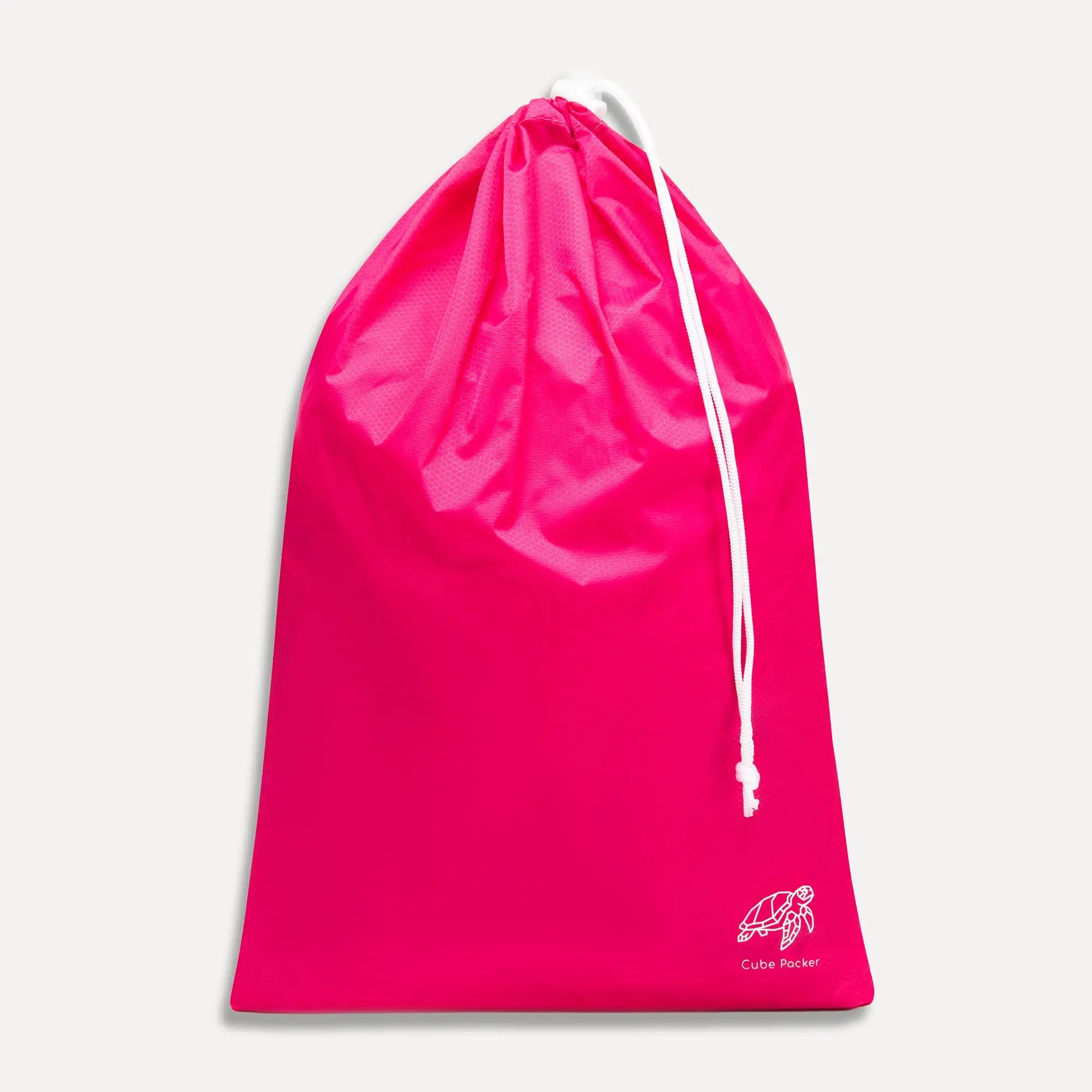 Cube Packer travel laundry bag in pink with drawstring closure for separating clothes while travelling