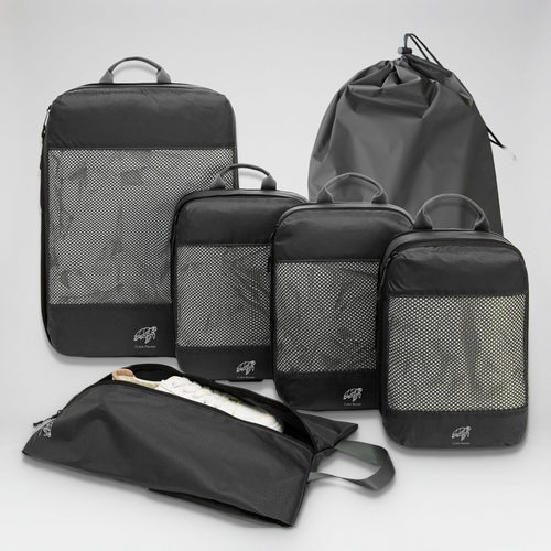 Cube Packer Essential Packing Bundle in Abyss Black: four compression packing cubes, laundry bag and shoe bag