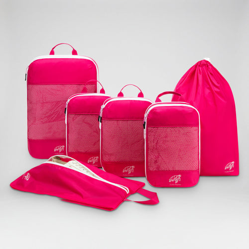 Cube Packer Essential Packing Bundle in Flamingo Pink: four compression packing cubes, laundry bag and shoe bag