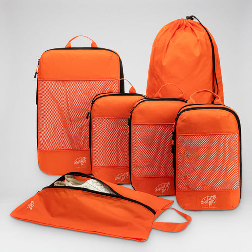 Cube Packer Essential Packing Bundle in Nemo Orange: four compression packing cubes, laundry bag and shoe bag
