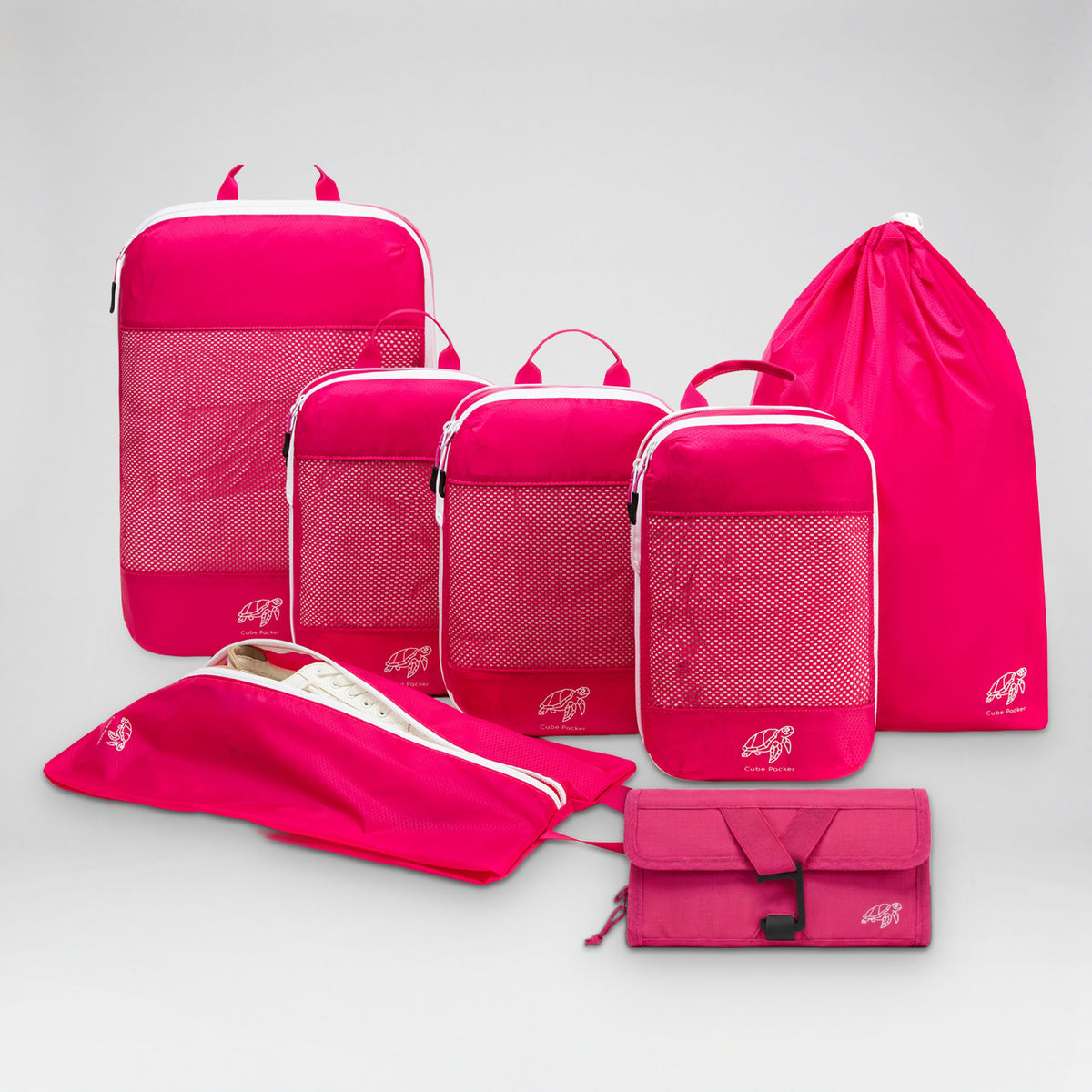 Cube Packer Travel System Bundle in Flamingo Pink: compression packing cubes, laundry bag, shoe bag and roll-up toiletry bag