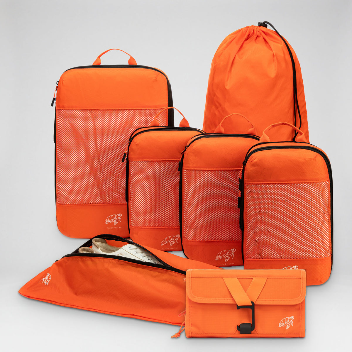 Cube Packer Travel System Bundle in Nemo Orange: compression packing cubes, laundry bag, shoe bag and roll-up toiletry bag