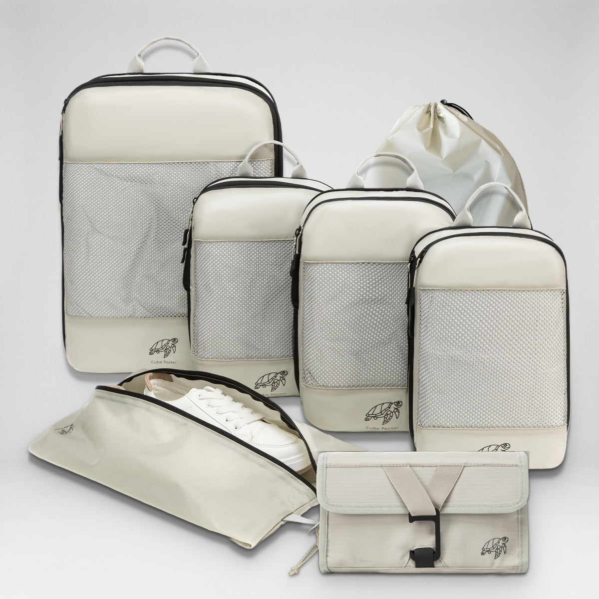Cube Packer Travel System Bundle in Sand: compression packing cubes, laundry bag, shoe bag and roll-up toiletry bag